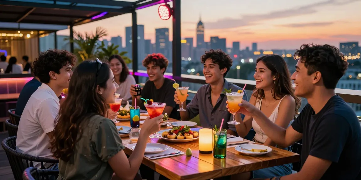 Group enjoying cocktails and appetizers in vibrant rooftop bar, celebrating rokok88 nightlife.